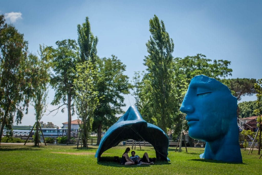 Puccini Festival park with two artworks by Mitoraj