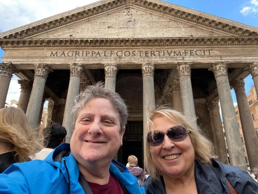 A group of people taking a selfie in front of Pantheon, Rome