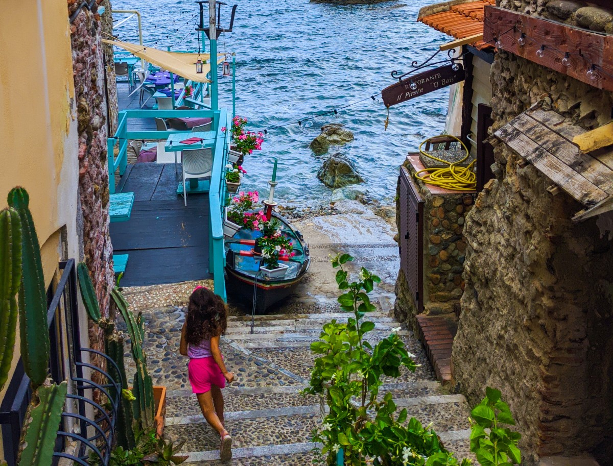 Girl running in Chianalea, Calabria