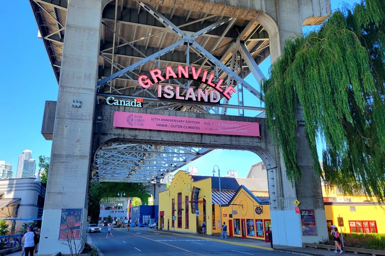 Neon Granville Island sign marking the entrance to Granville Island in Vancouver