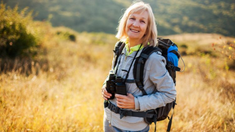 senior solo traveler hiking