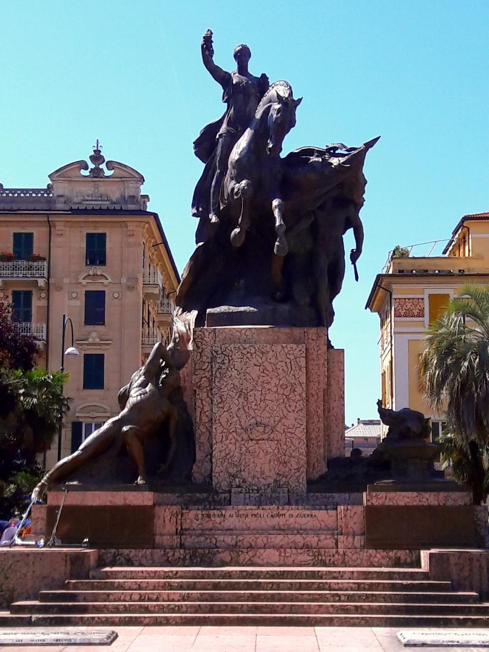 A statue of a person riding a horse