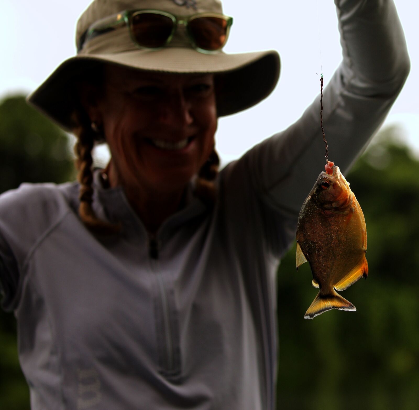 Guest in the Amazon with piranha