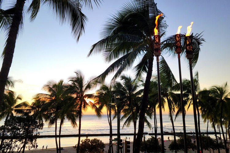 Is staying at Waikiki Beach a good choice for a vacation in Oahu, Hawaii?