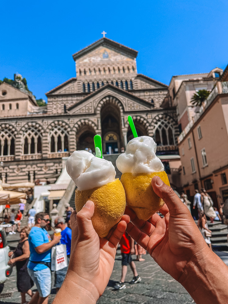 Trying lemon sorbet in Amalfi, Italy