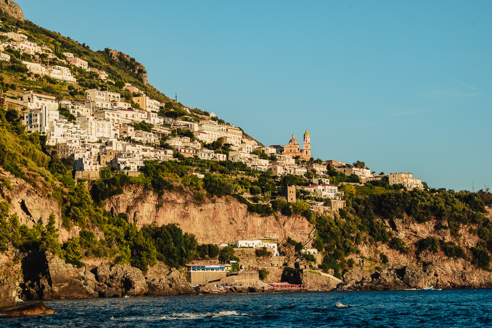 The town of Praiano at sunset as seen from the sea