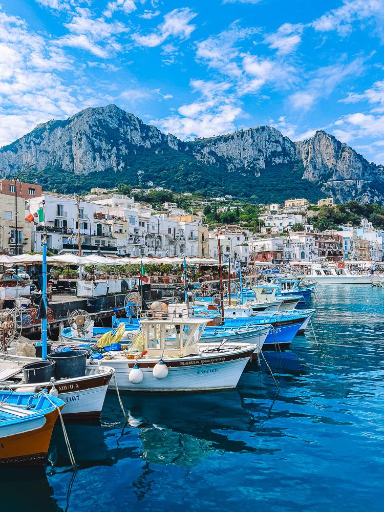 Traditional gozzo boats lined up in the harbour of Marina Grande, Capri