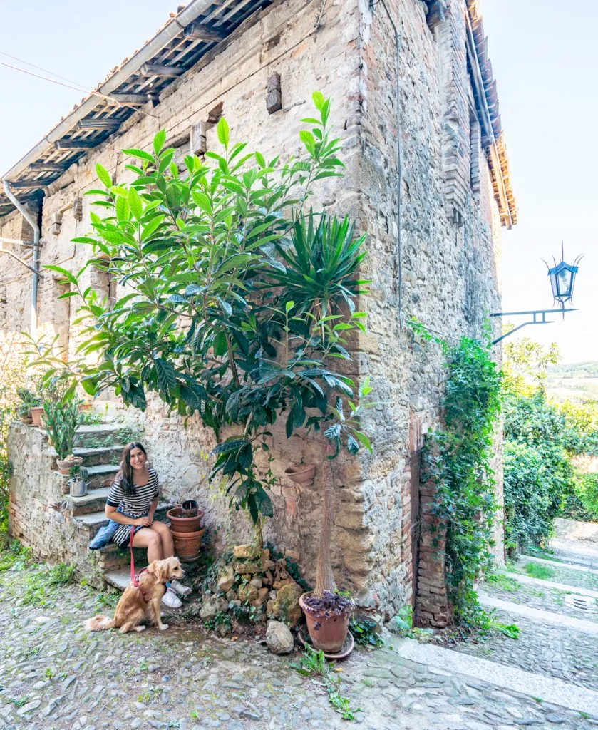 Kate Storm and Ranger Storm on a cobblestone street in Castell Arquato, Italy