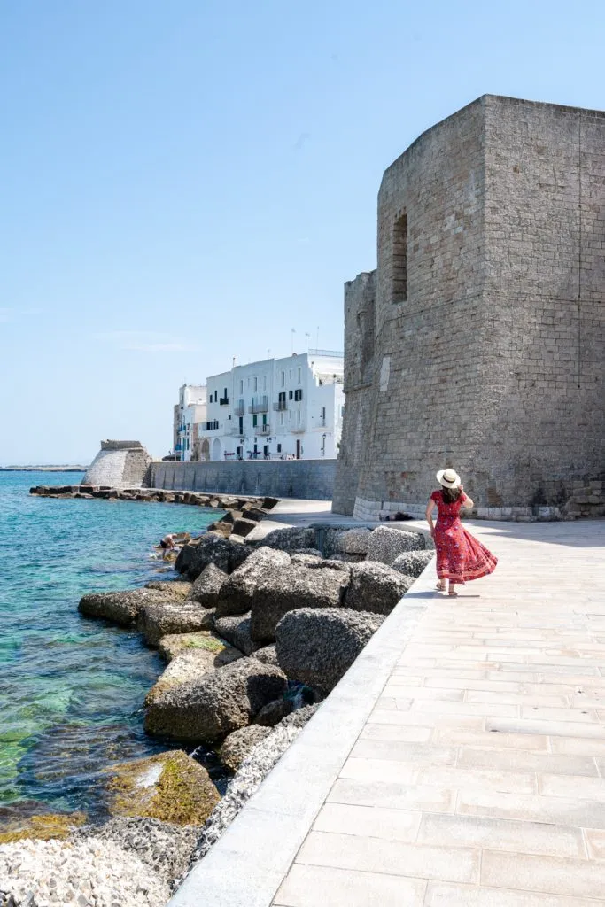 Kate Storm walking along the Lungomare in Monopoli, a beautiful town in Puglia