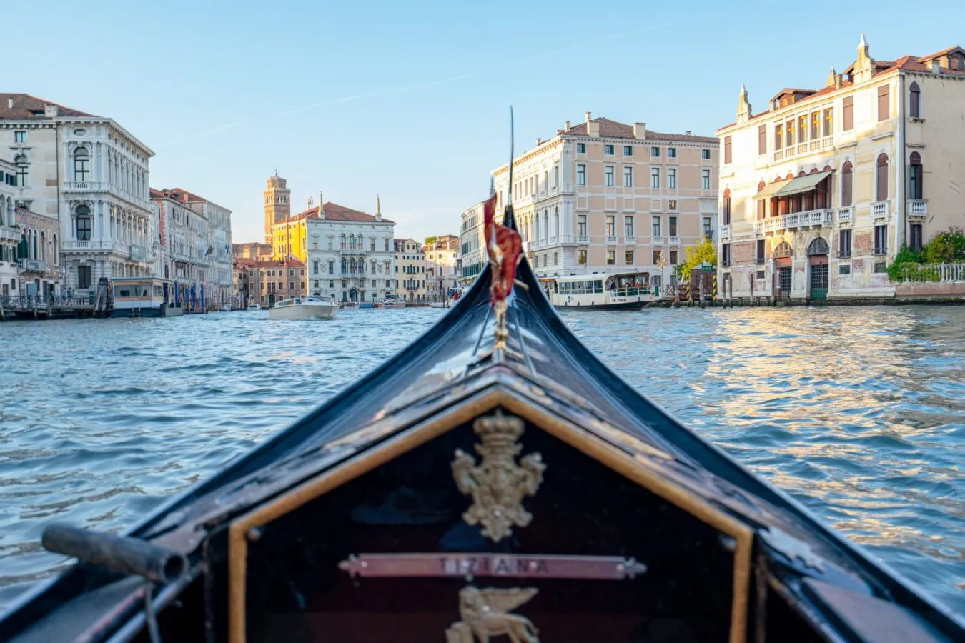 A view of the Grand Canal from the front of a Venetian gondola