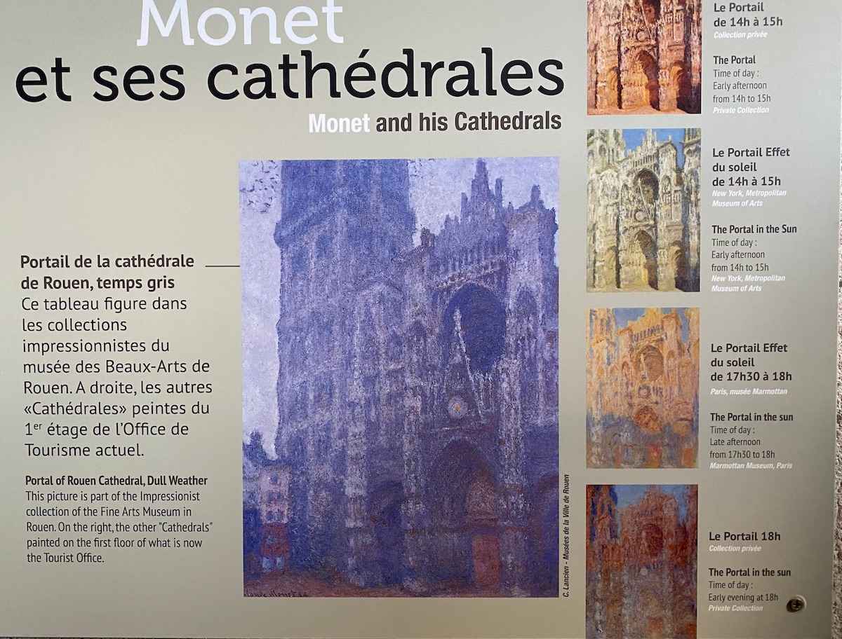 Sign displaying various versions of Monet's Rouen Cathedral Series.