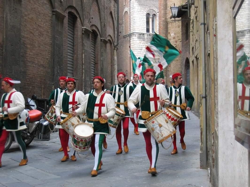 A group of people marching in a street