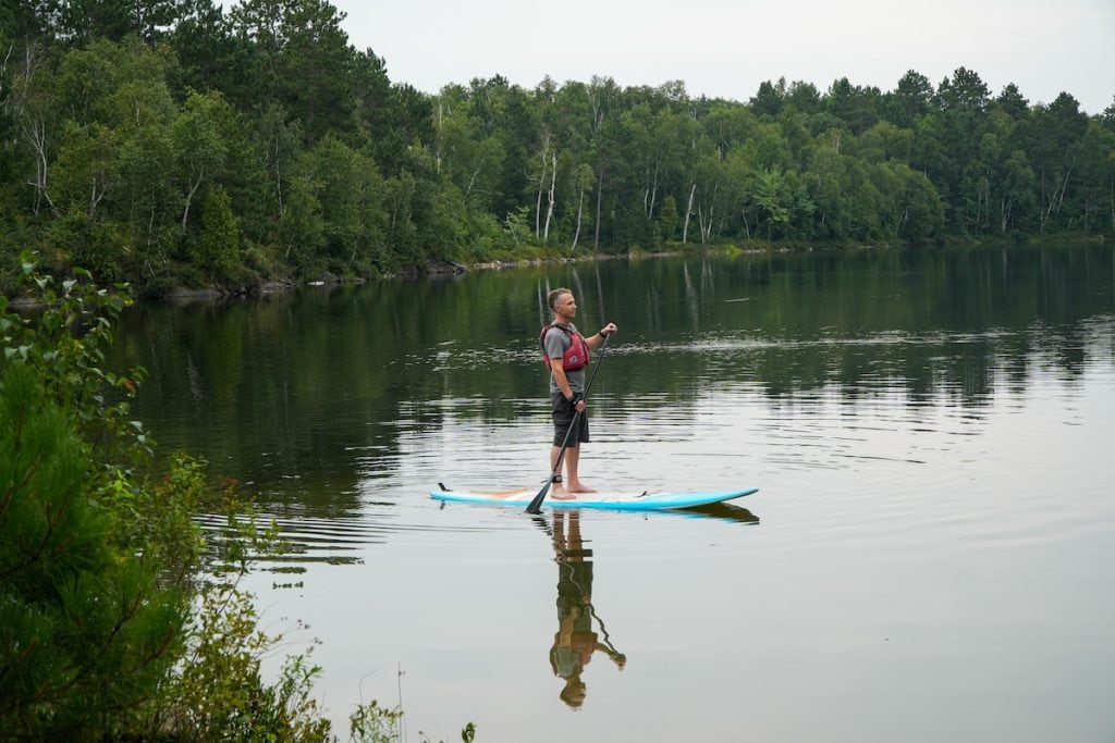 Paddle-boarding on Crowley Lake in Sudbury, Ontario.