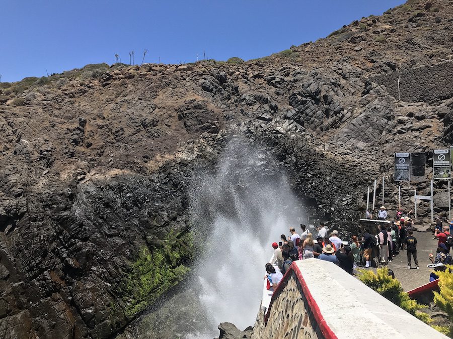 People photographing the spray at La Bufadora blowhole.