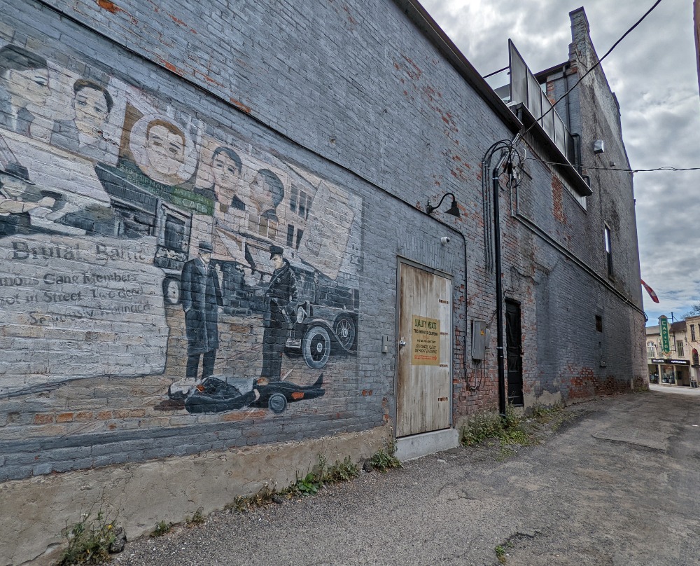 Laneway off Walton Street is one of the top IT filming locations in Port Hope as it still has props from the movies, a mural and door