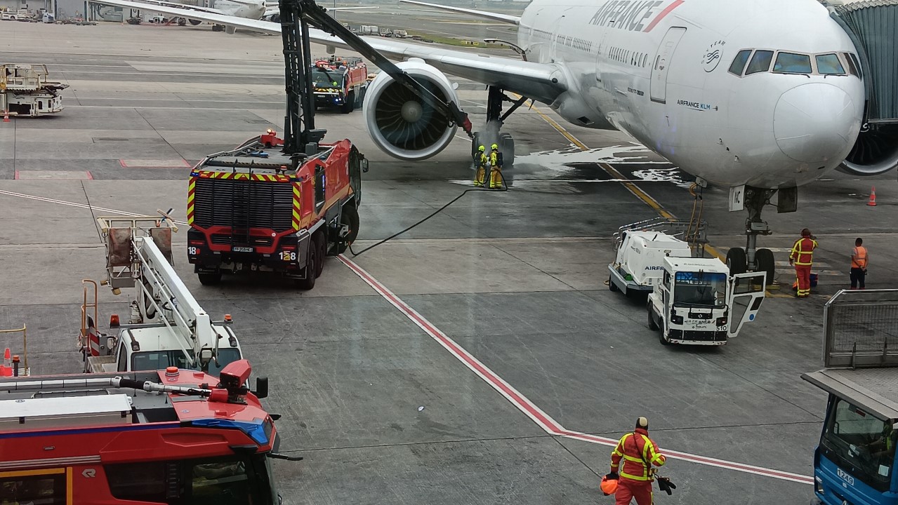 Not our plane on fire... Paris Charles de Gaulle Airport, Terminal 2E, Gate 30