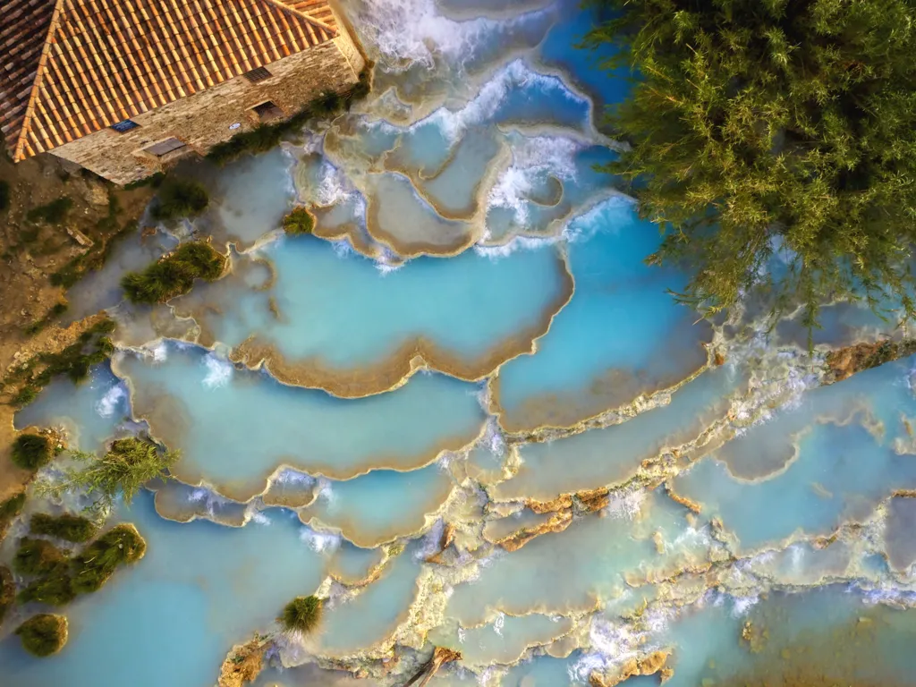 Above, a breathtaking view of Saturnia hot springs in Tuscany, one of the must-see's in Italy