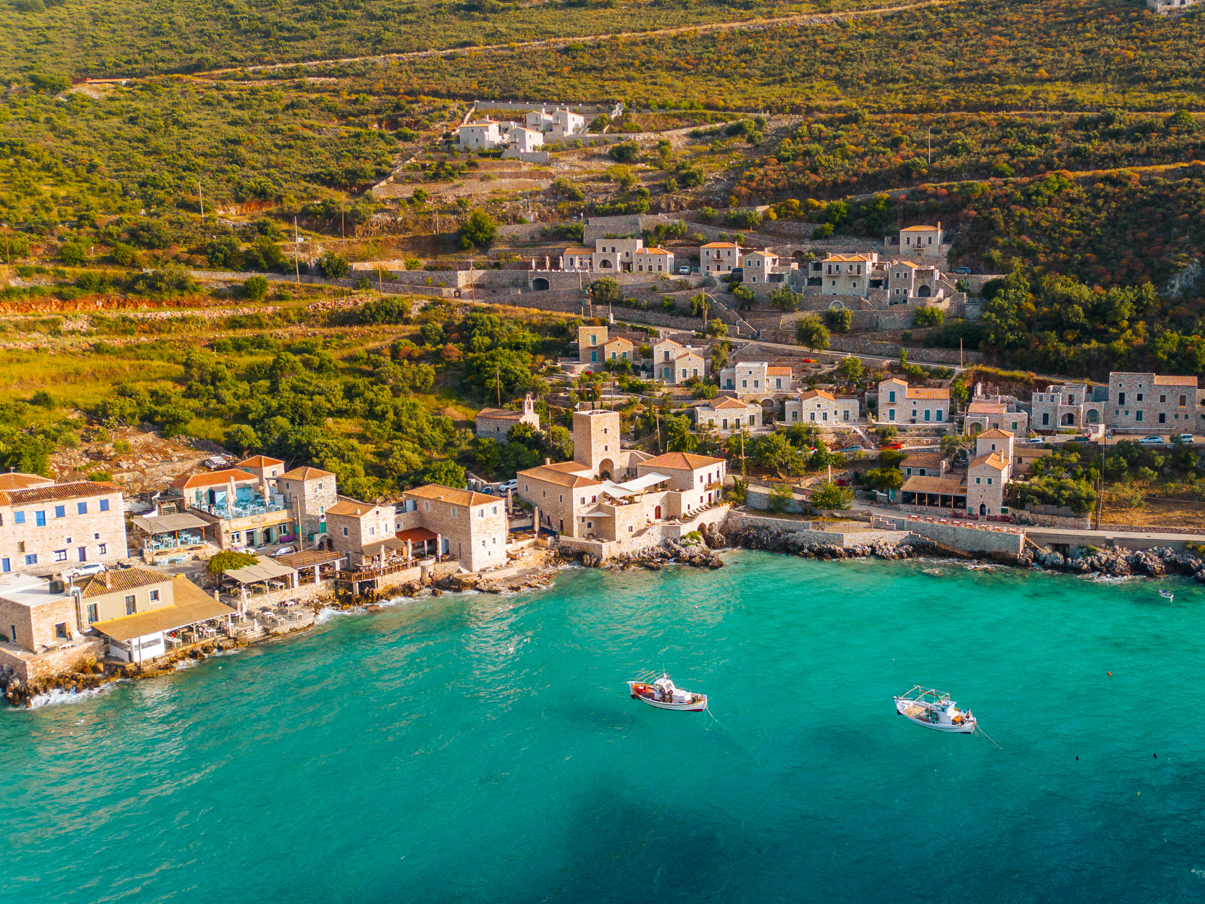 A panoramic drone shot of the seaside village of Limeni in the Peloponnese.