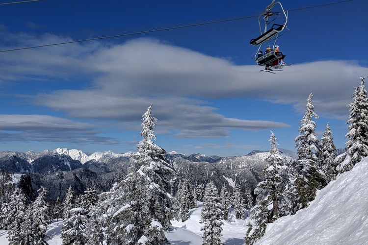 Winter at Mount Seymour chair lift with snow, best ski resorts in Vancouver British Columbia Canada