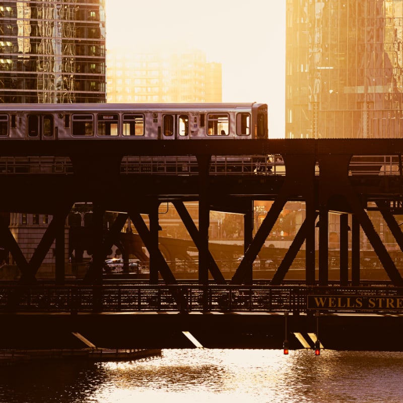 A train crossing the river on a bridge in Chicago