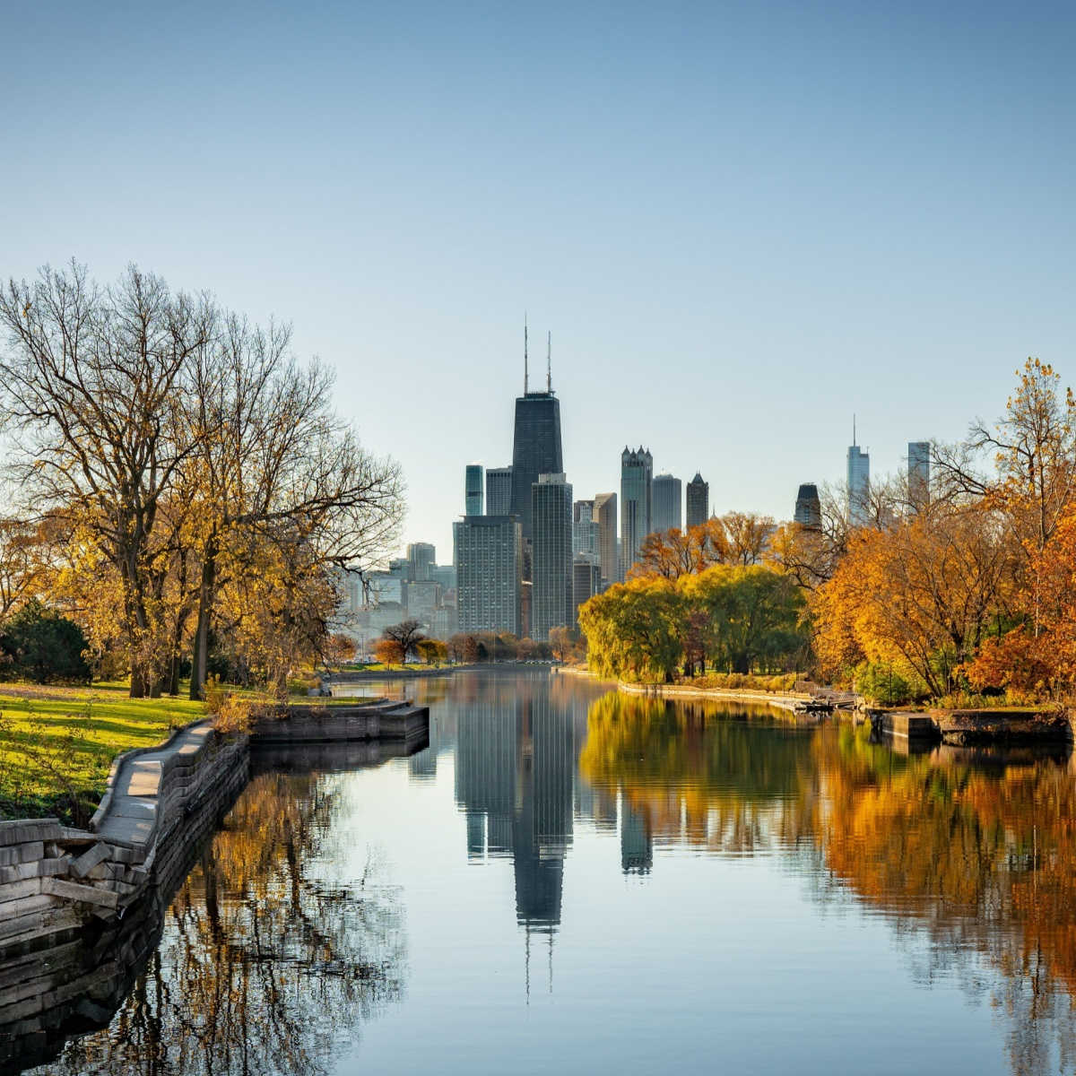 Chicago skyline at dawn in autumn with canal