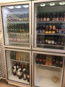 a refrigerator filled with beverages