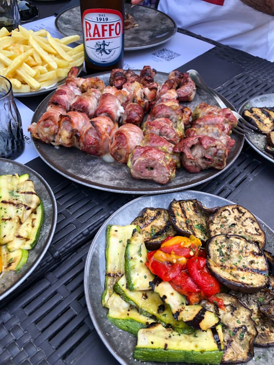 Bombette, delicious meat rolls stuffed with bacon and caciocavallo cheese, a local specialty from the Itria Valley, Locorotondo, Puglia region of Italy