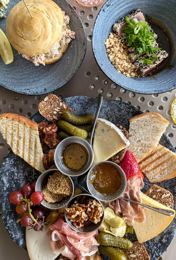 Lobster Roll, Tuna Tataki, and Charcuterie Plate from Table Rock Bistro