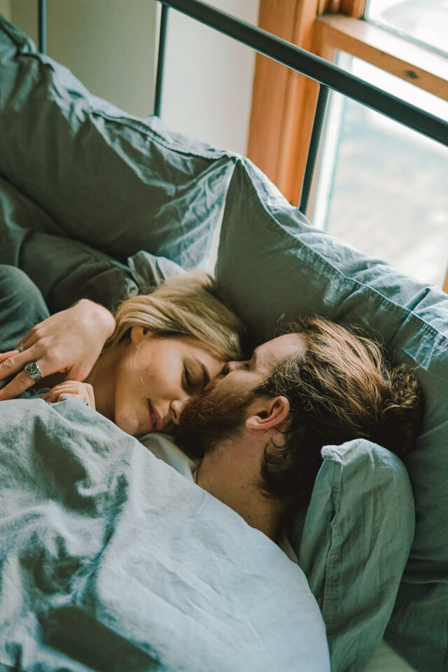 Couple lying in bed