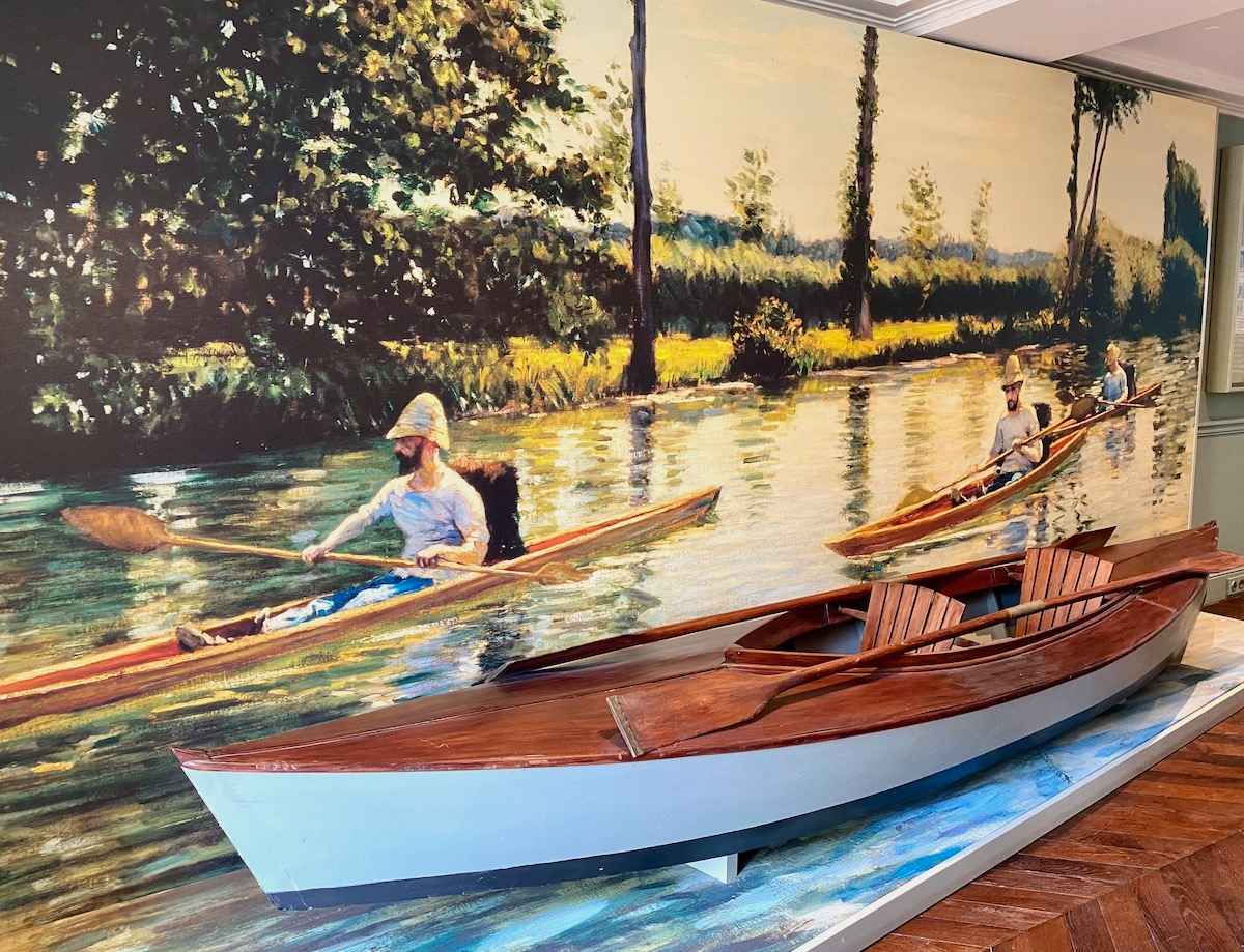 Reproduction of Boating on the Yerres by Gustave Caillebotte.