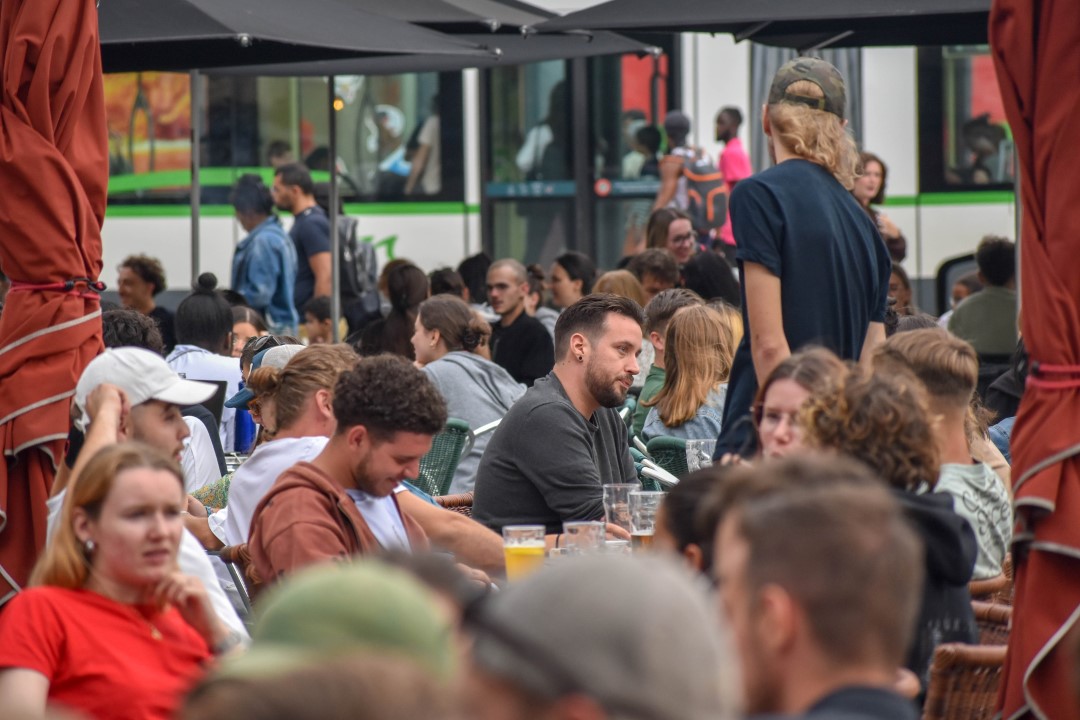 French citizens dining and enjoying drinks, late August 2024, downtown Nantes