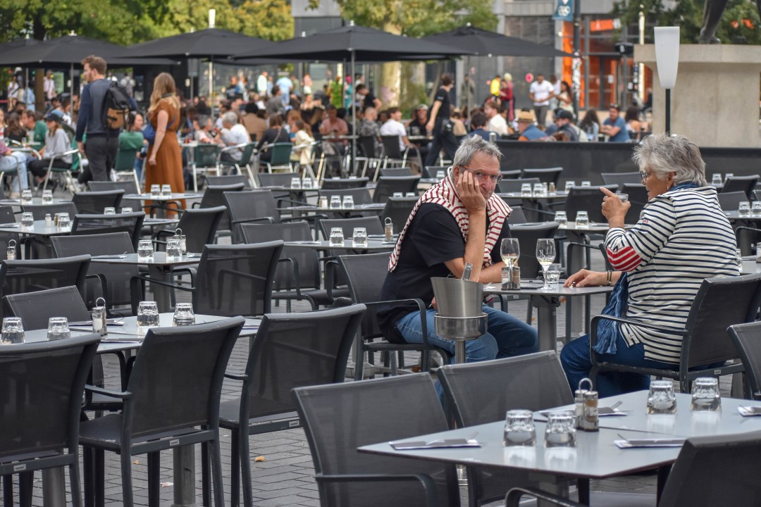 French citizens dining and enjoying drinks, late August 2024, downtown Nantes