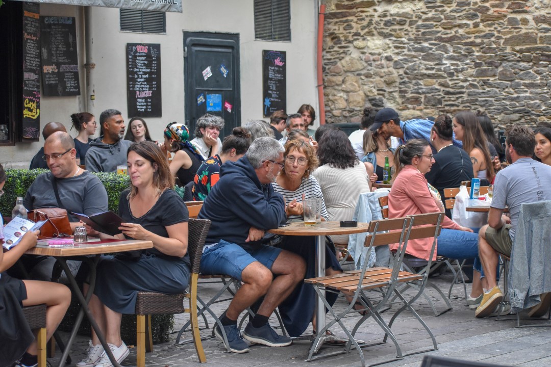 French citizens dining and enjoying drinks, late August 2024, downtown Nantes