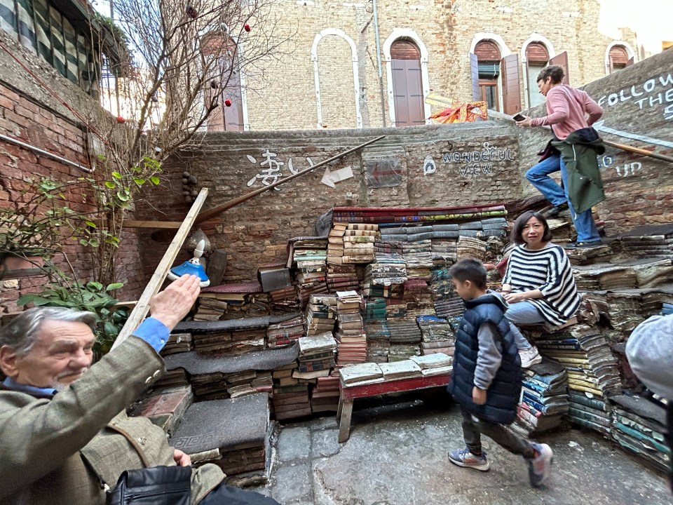 Outside-steps-made-from-books-at-Libreria-Acqua-photo-by-Margie-Miklas