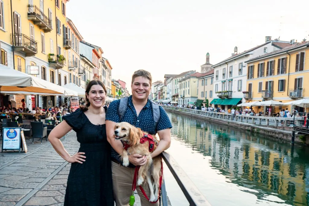 A family in front of a canal during one day in Milan