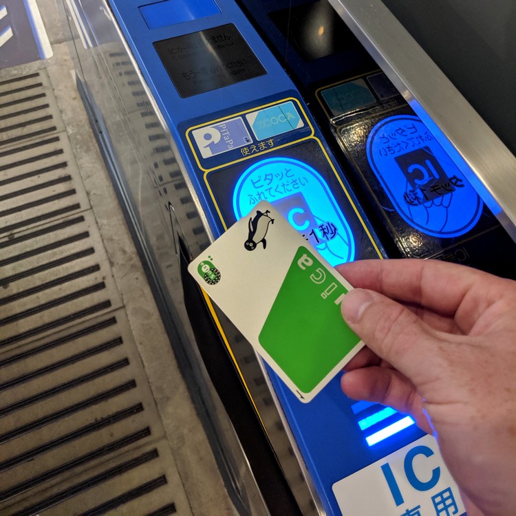 how to use Suica card at train stations in Tokyo Japan