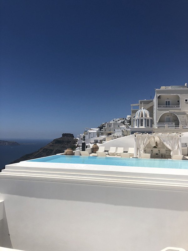 A pool with a view in Fira - One of the luxurious things to do in Santorini on your Itinerary