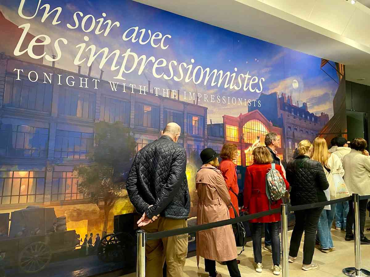 People attending the Tonight With the Impressionists event at the Musee d'Orsay