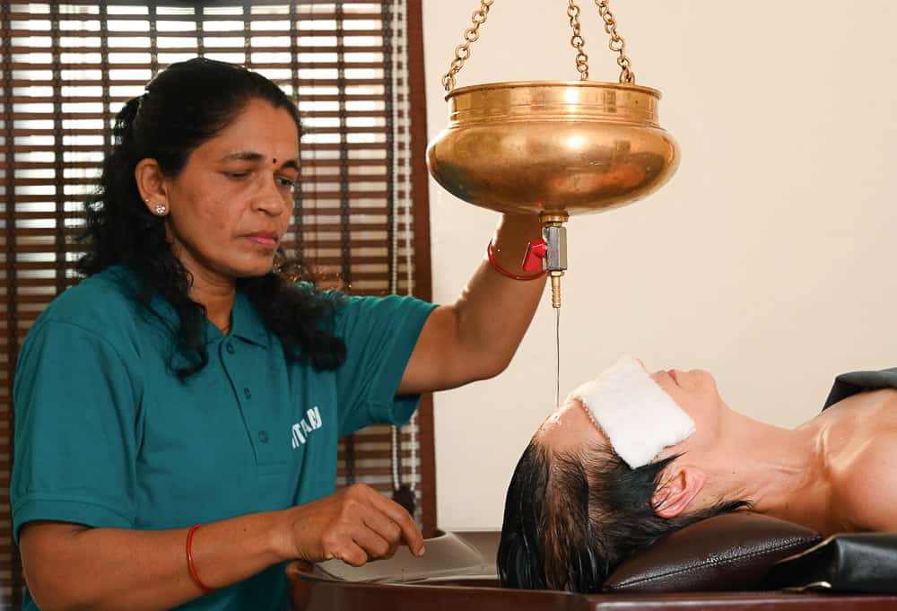 Shirodhara treatment at Hitayu Ayurveda retreat India