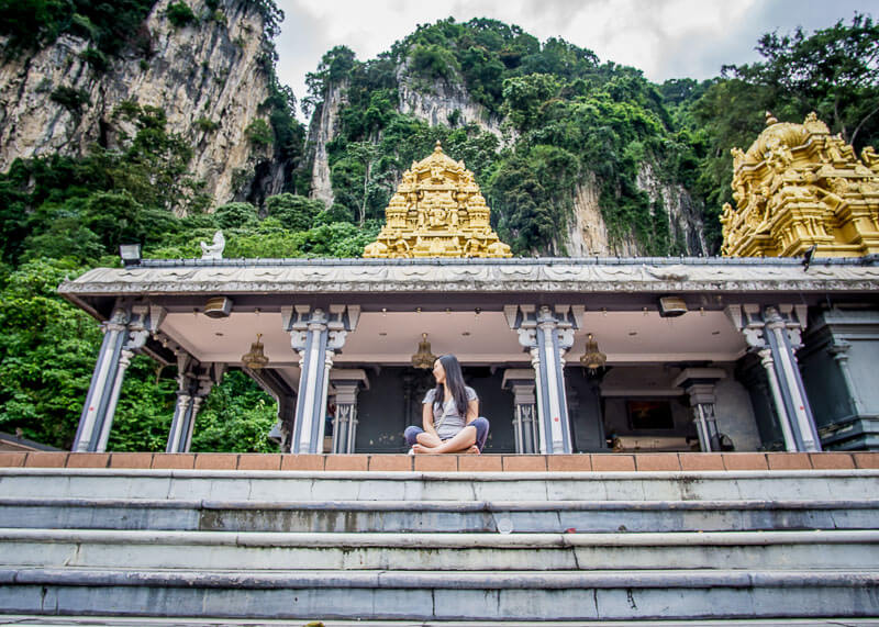 Climbing Batu Caves Steps to See the Famous Temple Cave | Kuala Lumpur has been on my bucket list for over a decade. The street food is incredible, along with the twin towers and the Batu caves. Click to read more and see the photography about the Batu Caves #nomad #batucaves #wanderlust #malaysia #slowtravel