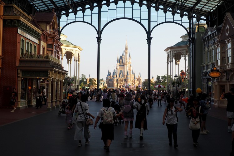 View Inside the World Bazaar at Tokyo Disneyland with Disney castle in the distance.