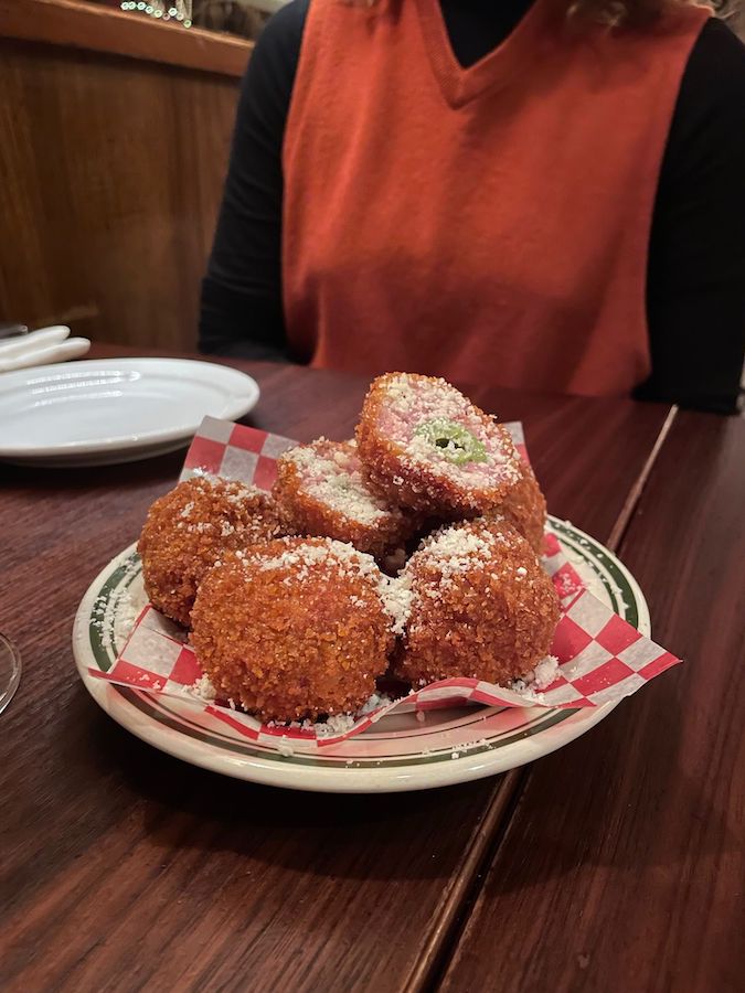 Fennel Sausage Wrapped Olives at Pepino's Spaghetti House