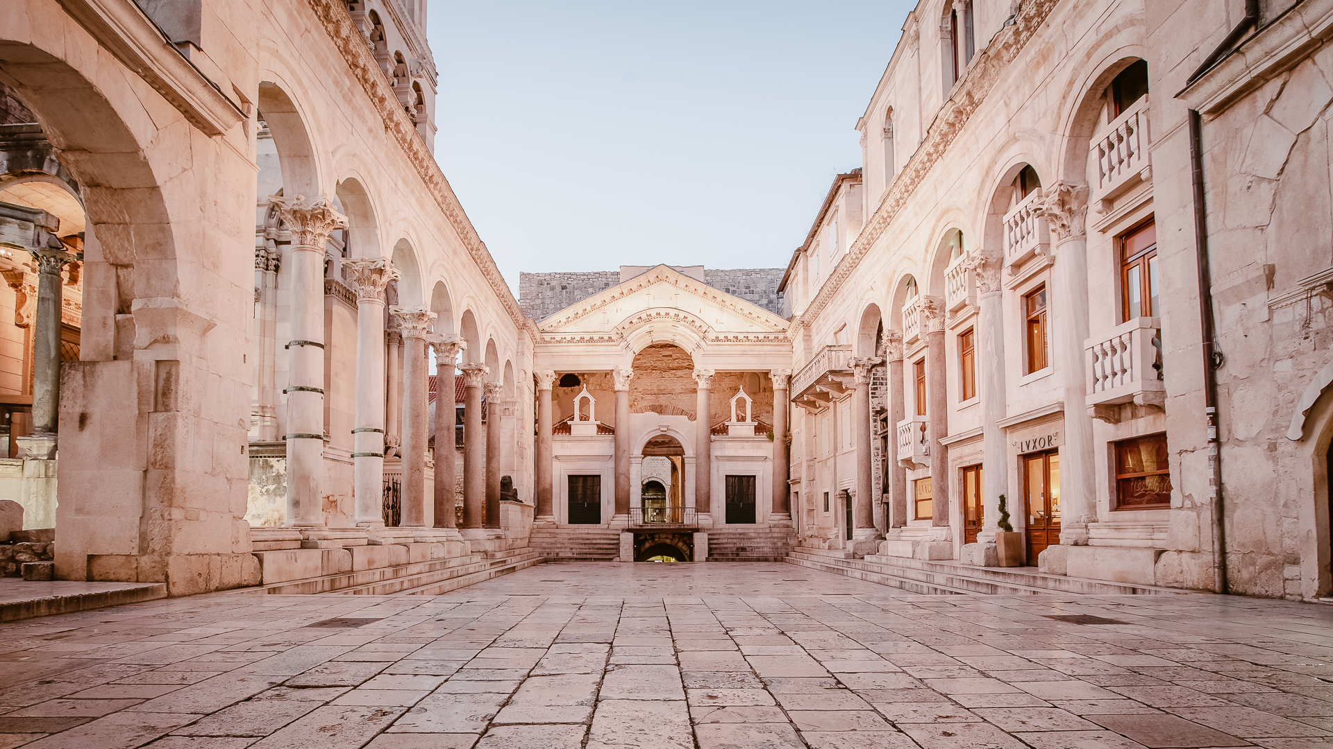 A charming cobblestone street in a square in Split, Croatia.