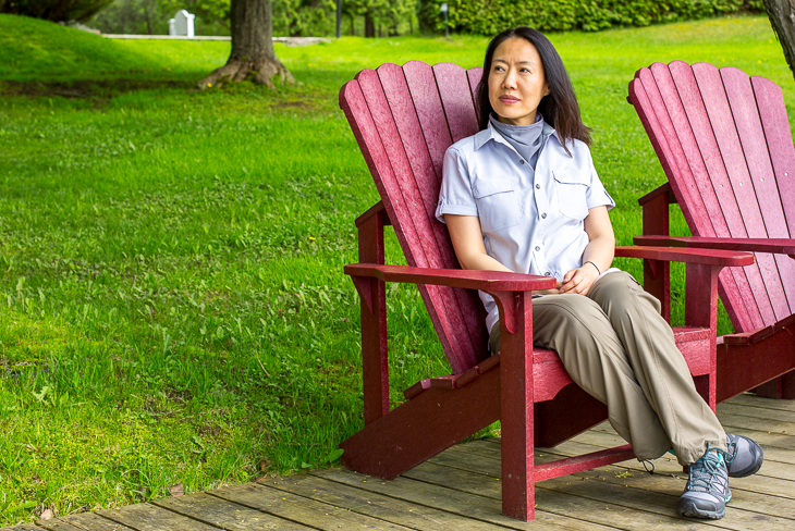 Asian woman wearing WindRiver mosquito repellent clothing.