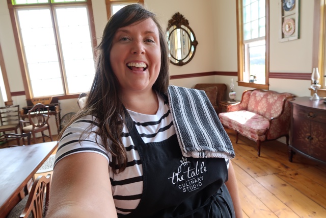 Cailin preparing for the Table Culinary Studio Oyster Obsession cooking class in PEI