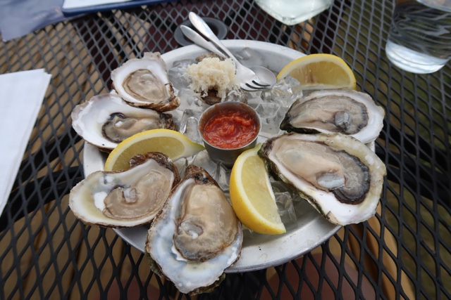 Half a dozen shucked oysters at The Wheelhouse Georgetown Restaurant