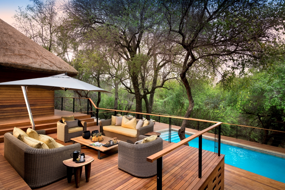 Outside deck and pool area at River House