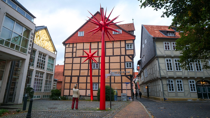 Modern art surrounded by Medieval buildings