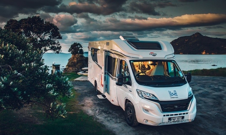 A motorhome freedom camping at night