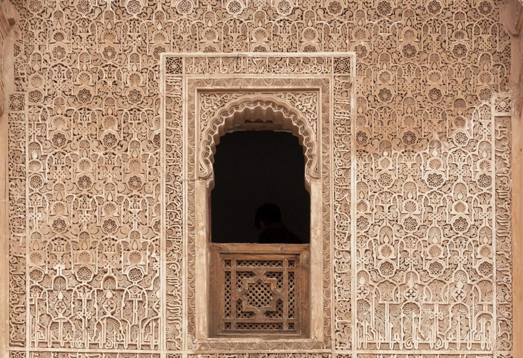 Exterior details of Moroccan palace decorated with arabesque ornaments